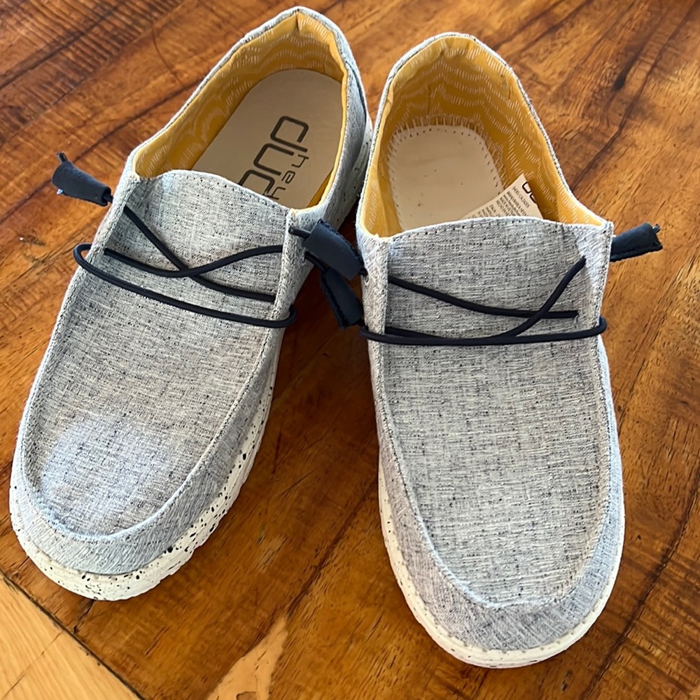 Hey Dude shoes. New never worn - but left is missing insole
